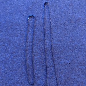 Sterling silver rope necklace and unknown silver rope necklace